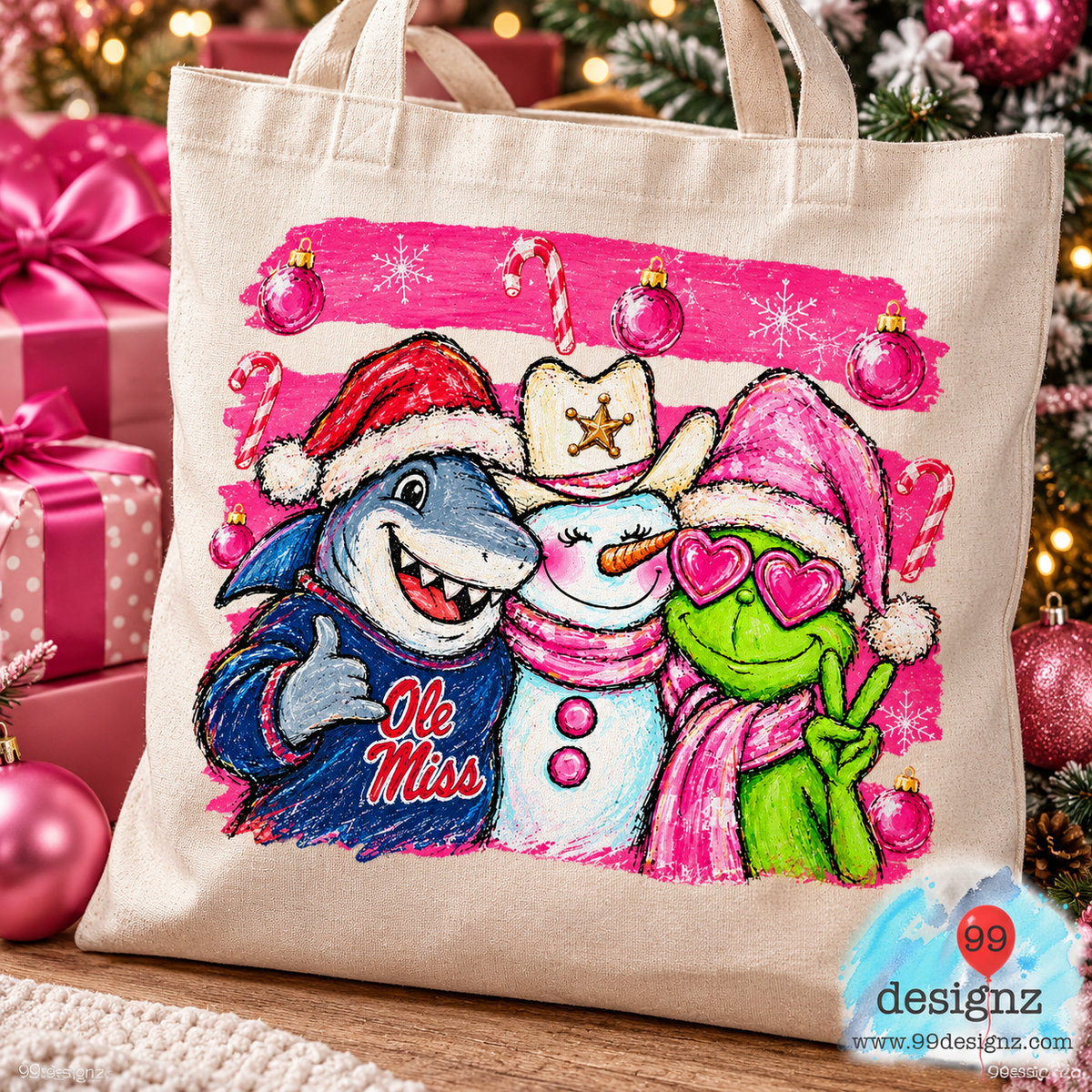 Canvas tote bag mockup displaying Ole Miss Christmas PNG artwork with a shark, snowman, and green character in heart glasses.