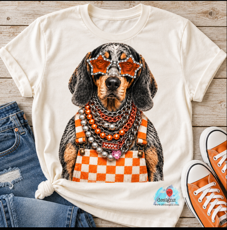 Cream T-shirt mockup showing dog artwork with orange checkerboard overalls, star sunglasses and layered jewelry; PNG digital design only, shirt not included.